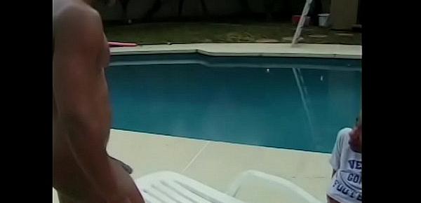  Horny black couple has sex in 69 position on a deck chair by the pool
